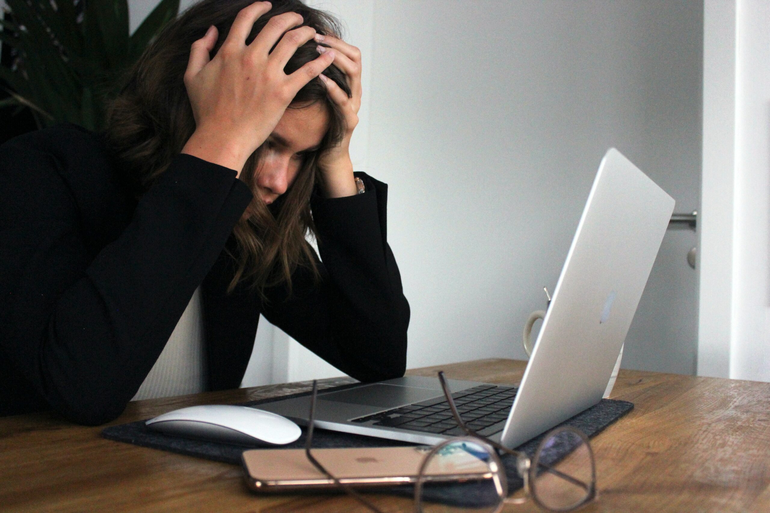 woman frustrated stressed laptop work