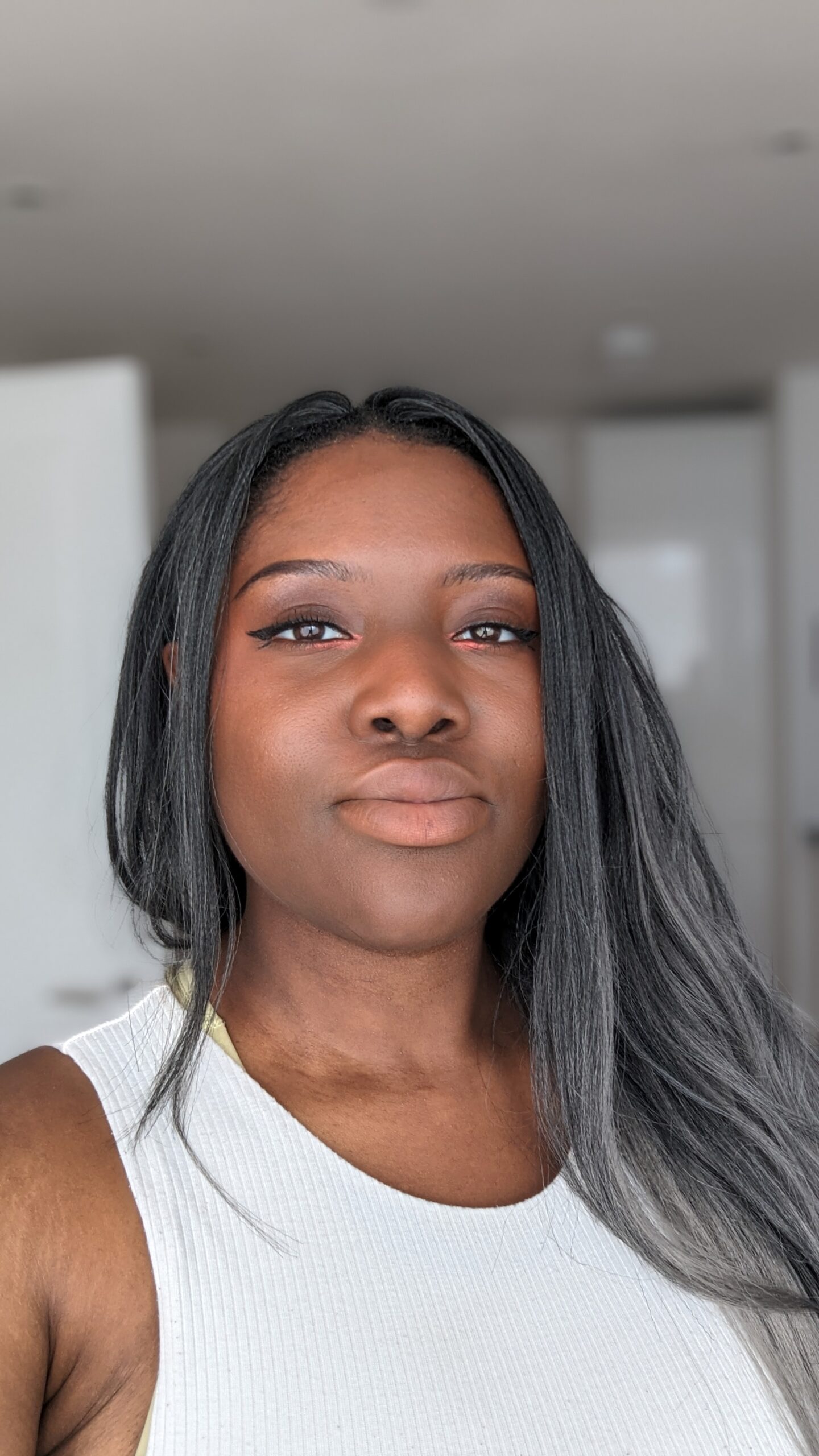 Feyi, wearing a white tip